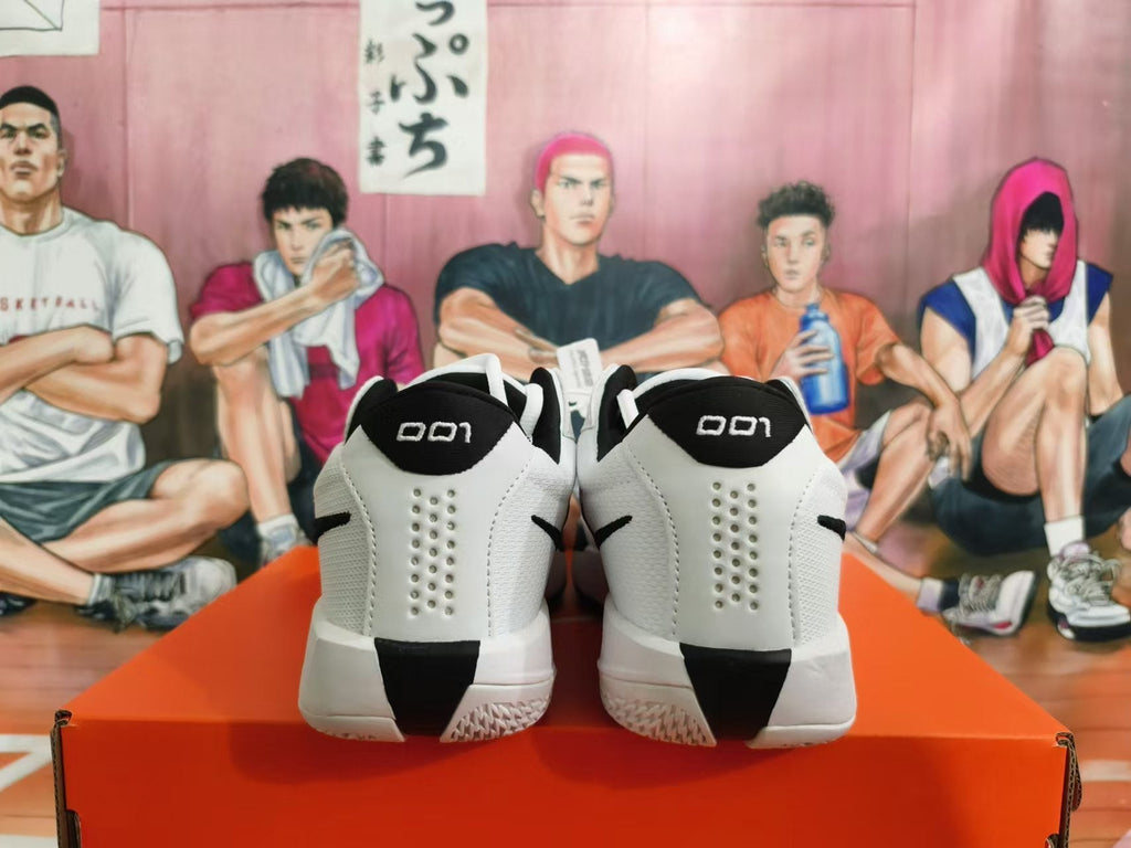 Nike Basketball Shoes in White and Black - product image from the listing.