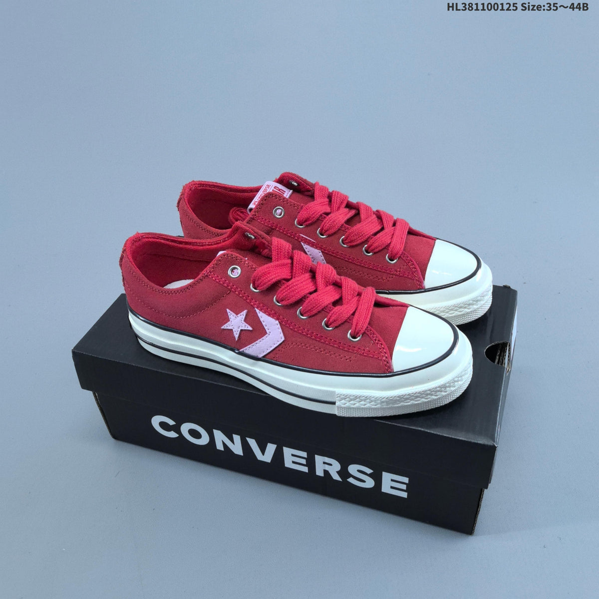 Converse Star Player Ox Low-Cut Sneakers in Navy/White - product image from the listing.