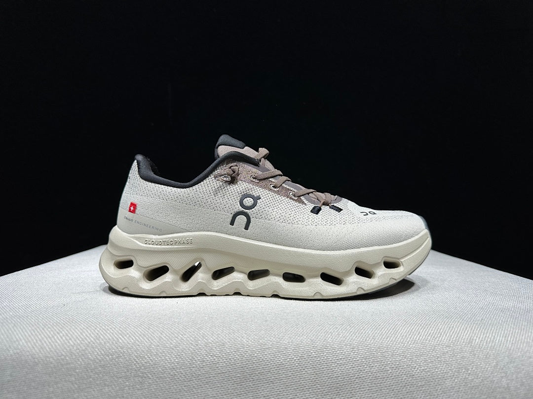 On Cloudtilt Sneakers, in Light Gray and Black - product image from the listing.