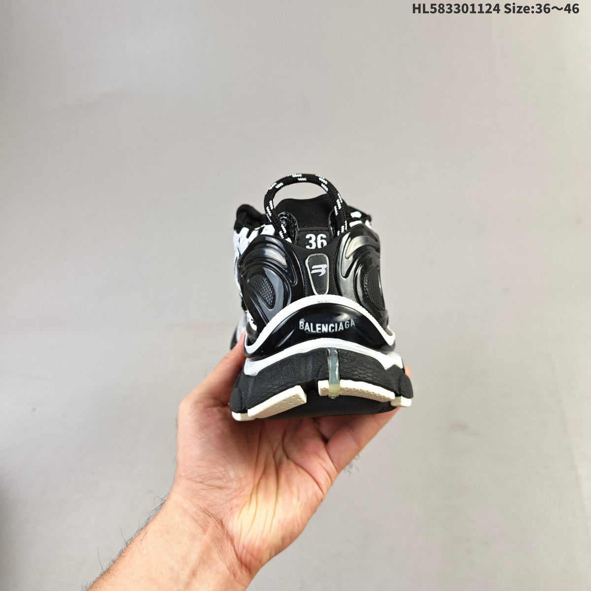 Black and White Balenciaga Runner Low-Top Sneakers - product image from the listing.
