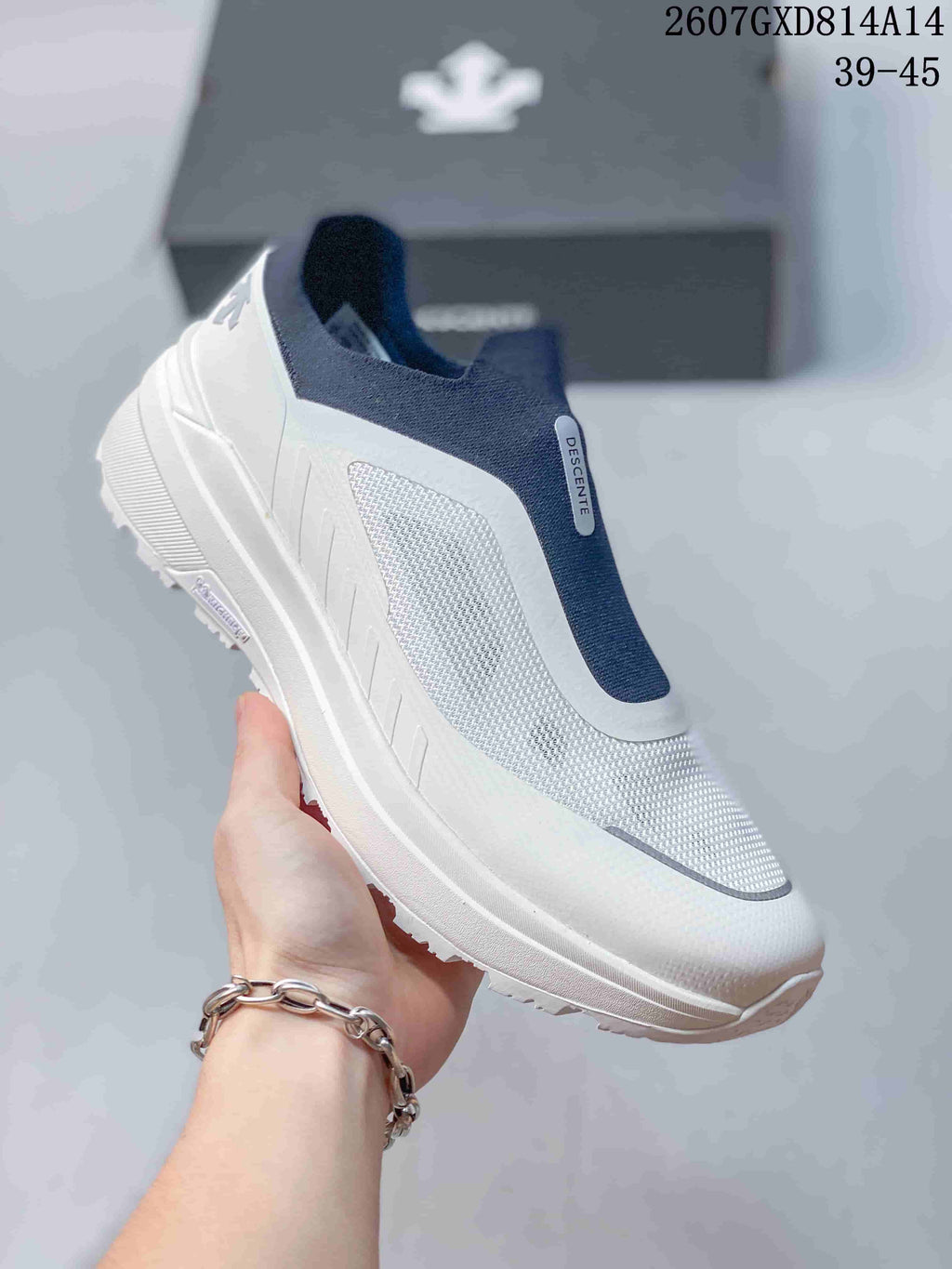 Descente Slip-On Sneakers in White and Navy 2607GXD814A14 - product image from the listing.