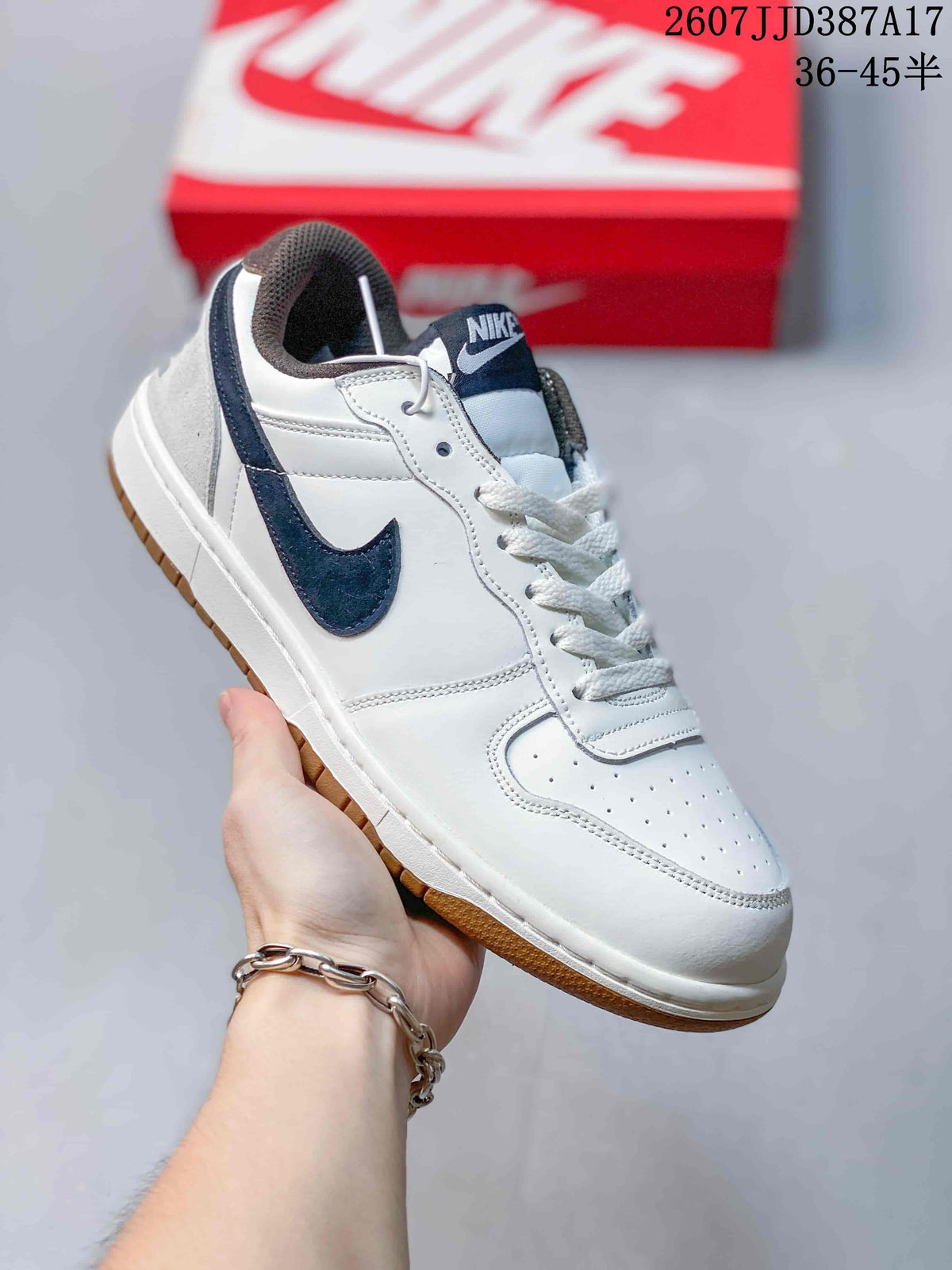 Nike Big Nike Low Sneakers in Black, Green, in White and Navy - product image from the listing.