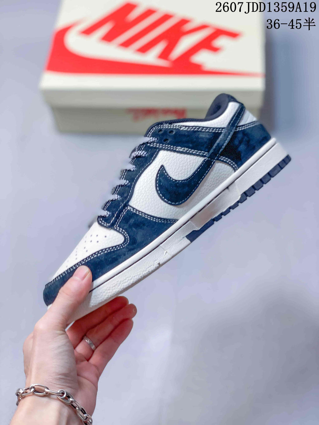Air Jordan 1 Low Navy White Sneakers 2607JDD1359A19 - product image from the listing.
