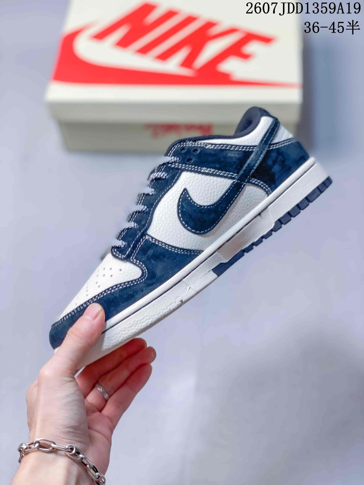 Air Jordan 1 Low Navy White Sneakers 2607JDD1359A19 - product image from the listing.