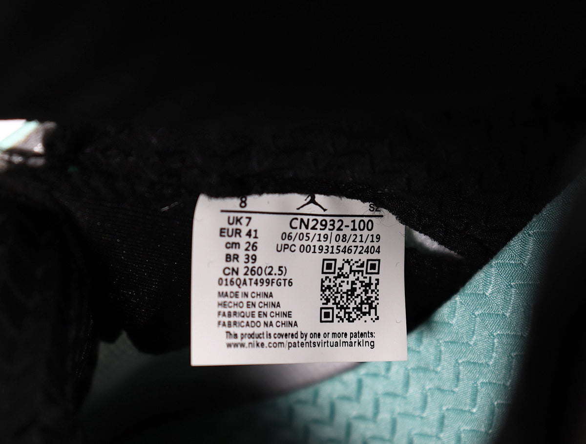 Jordan 4 Retro Sneakers in White and Mint CN2932-100 - product image from the listing.