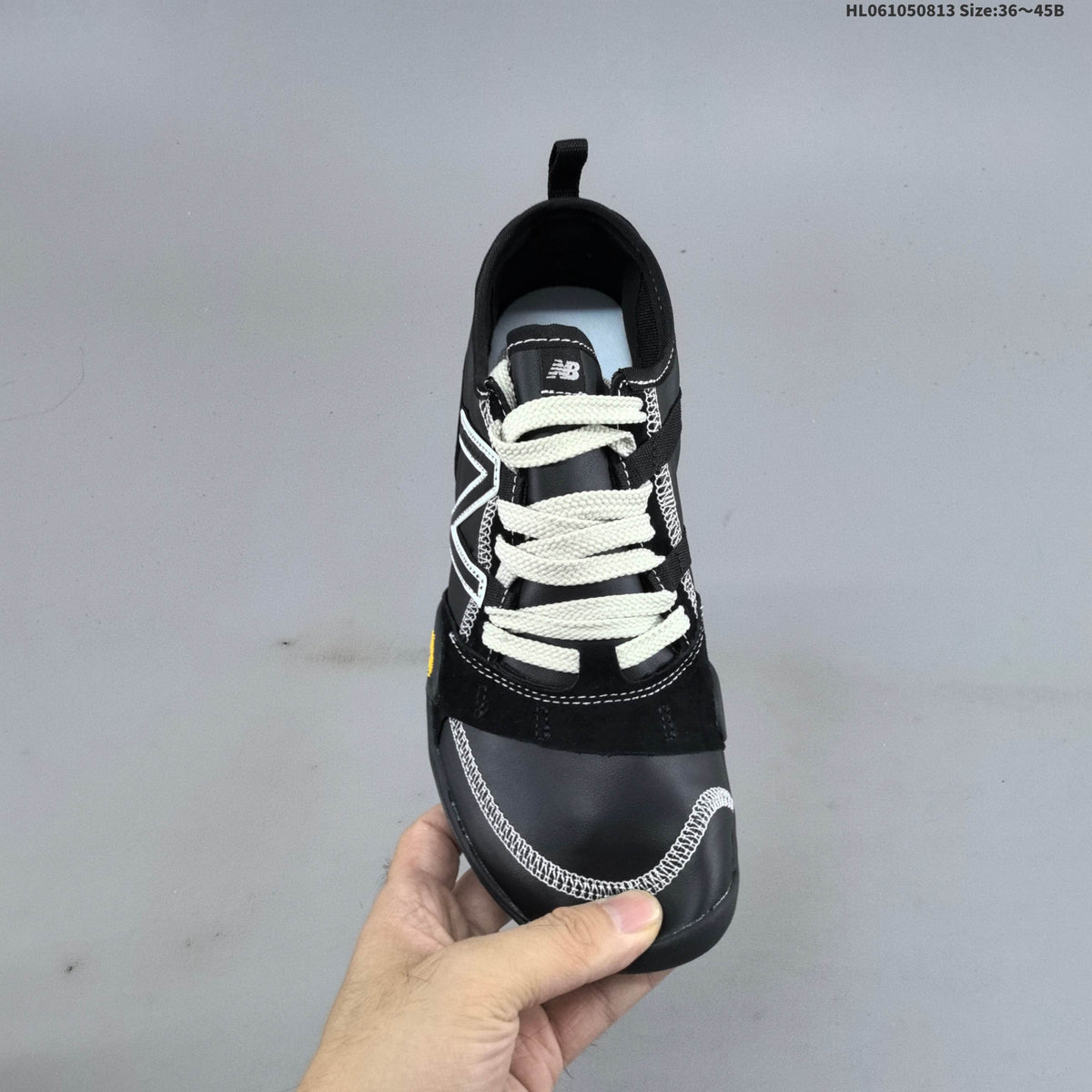 Black New Balance MT10O6NW Low-Profile Sneakers - product image from the listing.