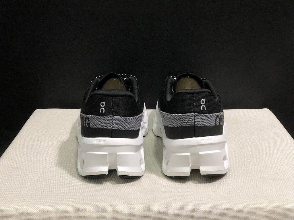 On Cloudmonster 2 Running Shoes in Black White - product image from the listing.