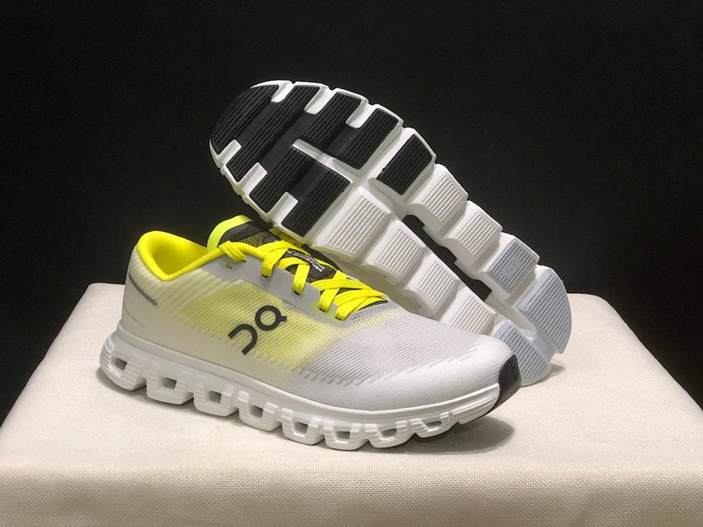 On Cloud 6 Push Sneakers in White and Yellow - product image from the listing.