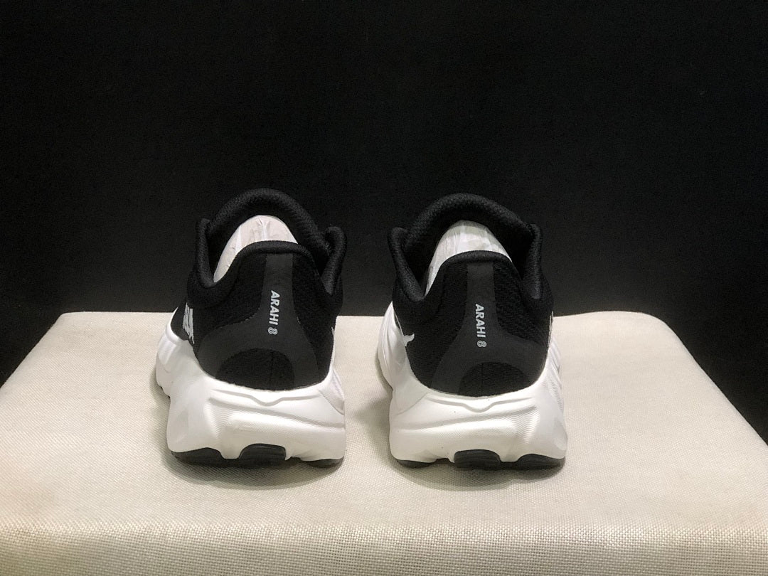 HOKA Arahi 8 Running Shoes in Black and White - product image from the listing.
