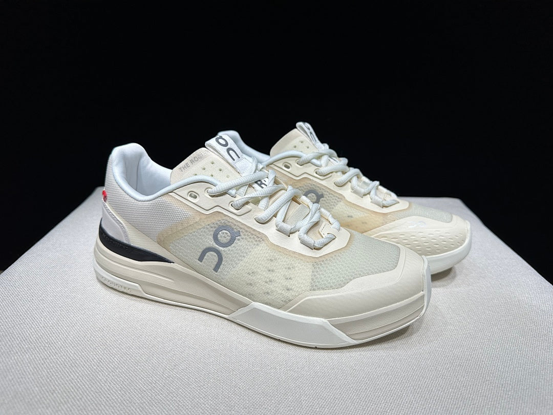 Cream and Black On The Roger Advantage Pro Sneakers - product image from the listing.