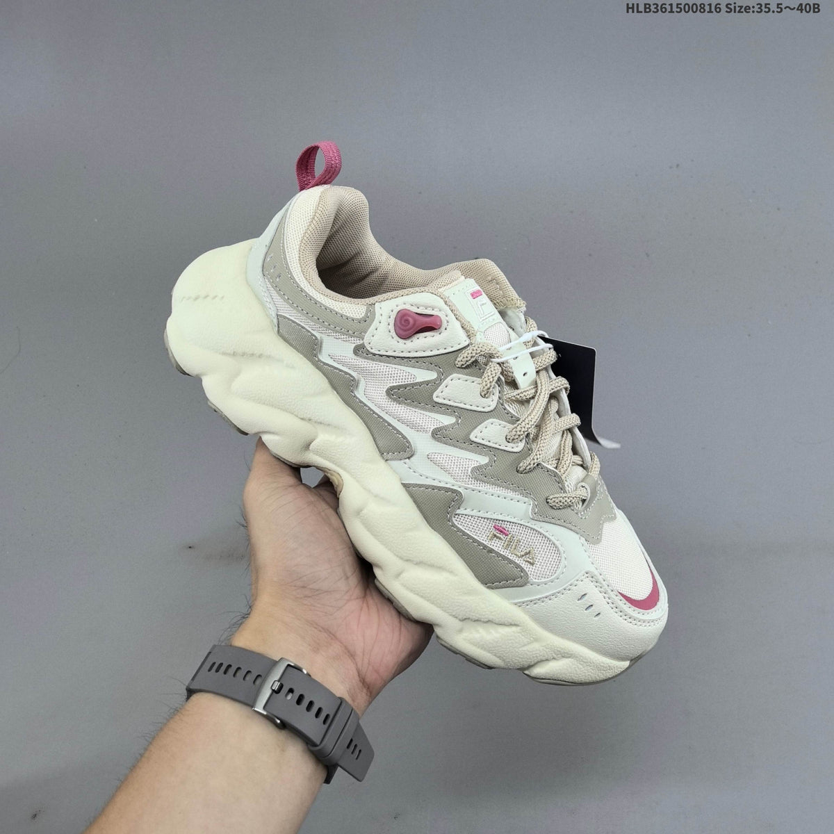 FILA Chunky Low-Top Sneakers in Cream or in Black - product image from the listing.