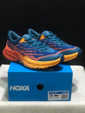 HOKA Speedgoat 5 Trail Running Shoes, in Blue and Orange - product image from the listing.