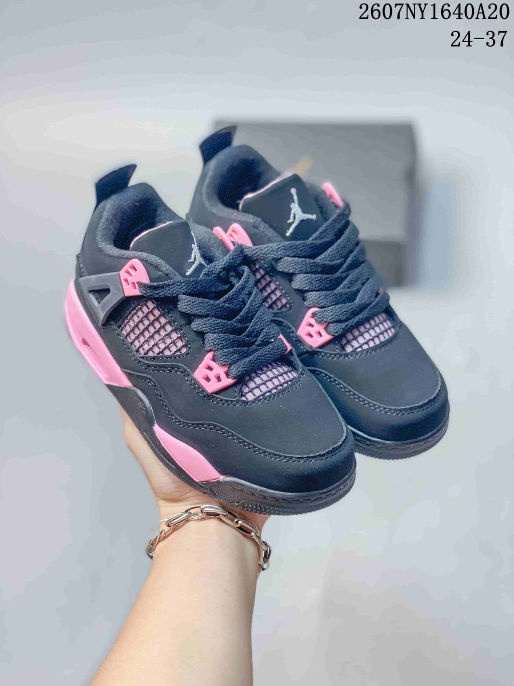 Jordan Panda Low-Top Kids Basketball Sneakers in Black Pink - product image from the listing.