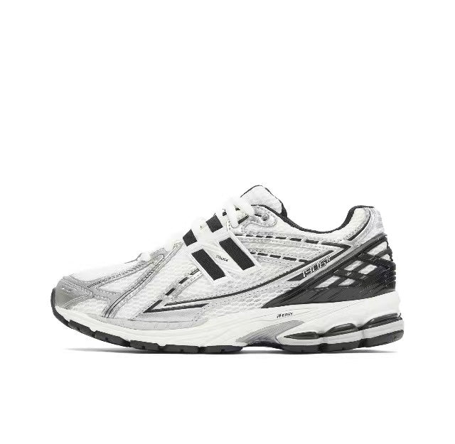White and Black New Balance M1906RER Sneakers - product image from the listing.