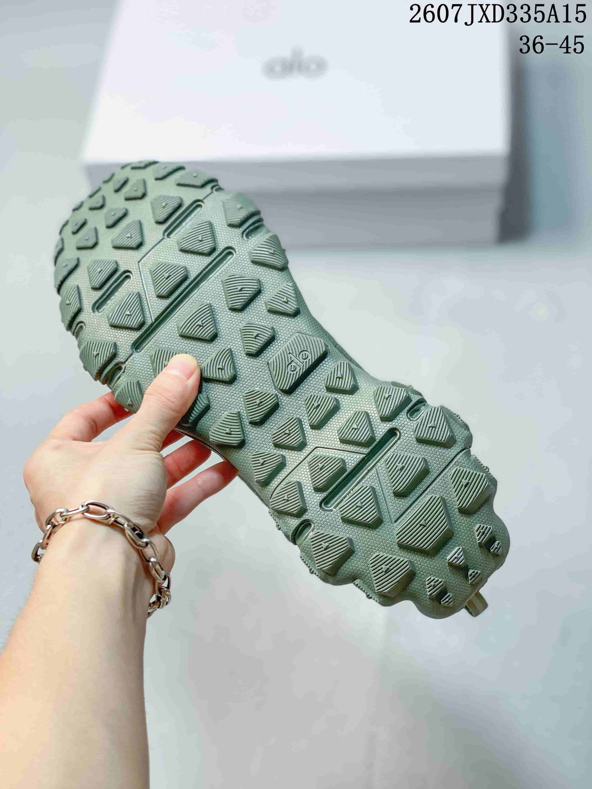 Alo Runner Trail Sneakers in Green 2607JXD335A15 - product image from the listing.