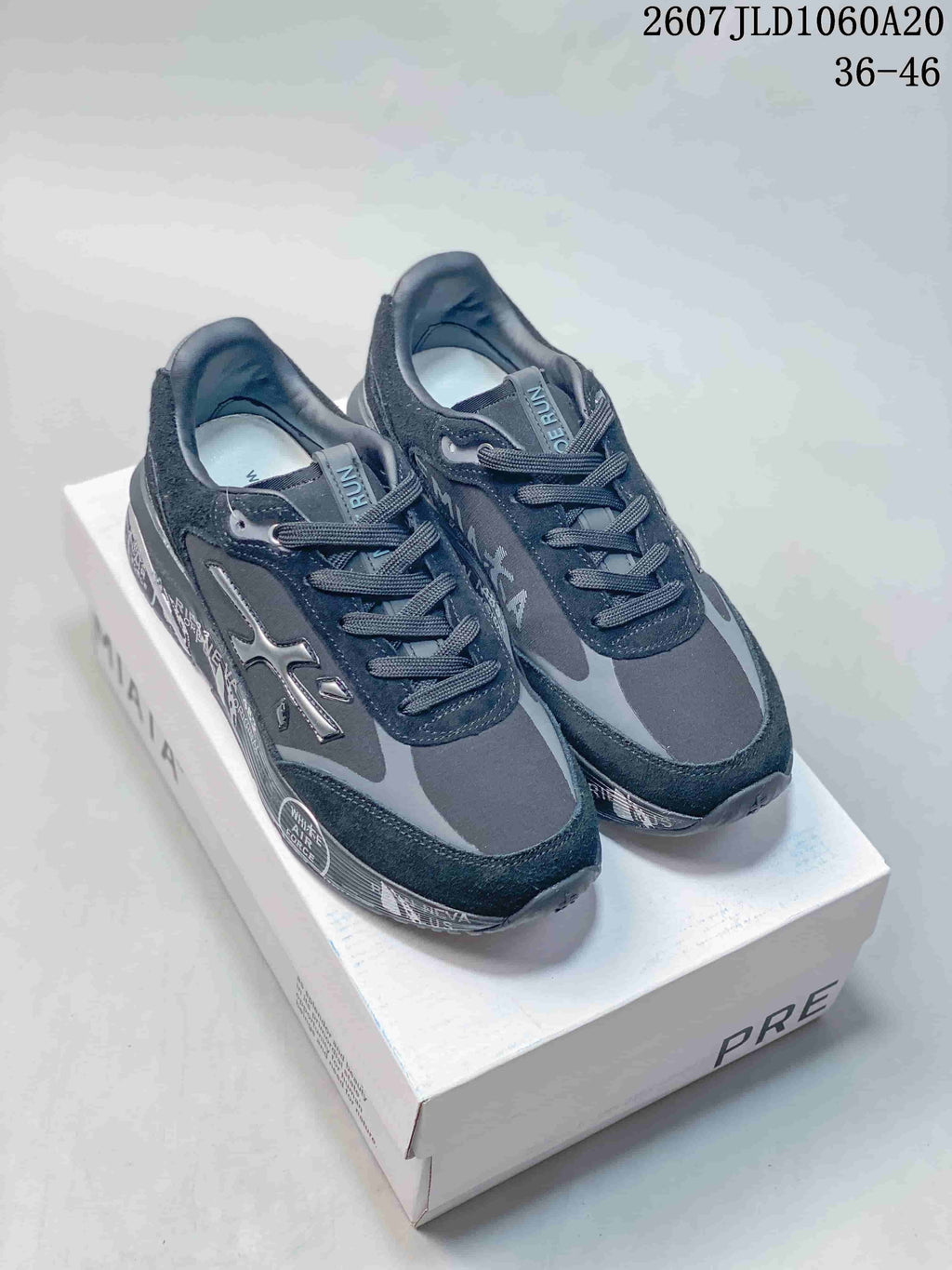 Premiata Lander Trainers in Black and Gray 712800TIT - product image from the listing.