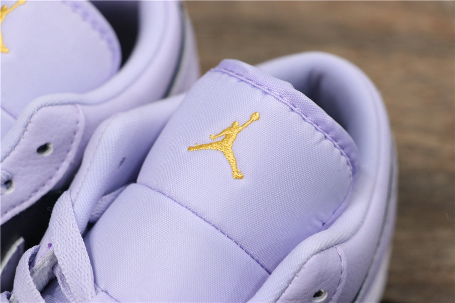 Air Jordan 1 Low Oxygen Sneakers in Purple 554723-505 - product image from the listing.