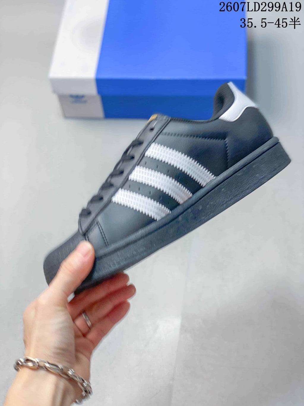 adidas Superstar Sneakers in Black White 2607LD299A19 - product image from the listing.