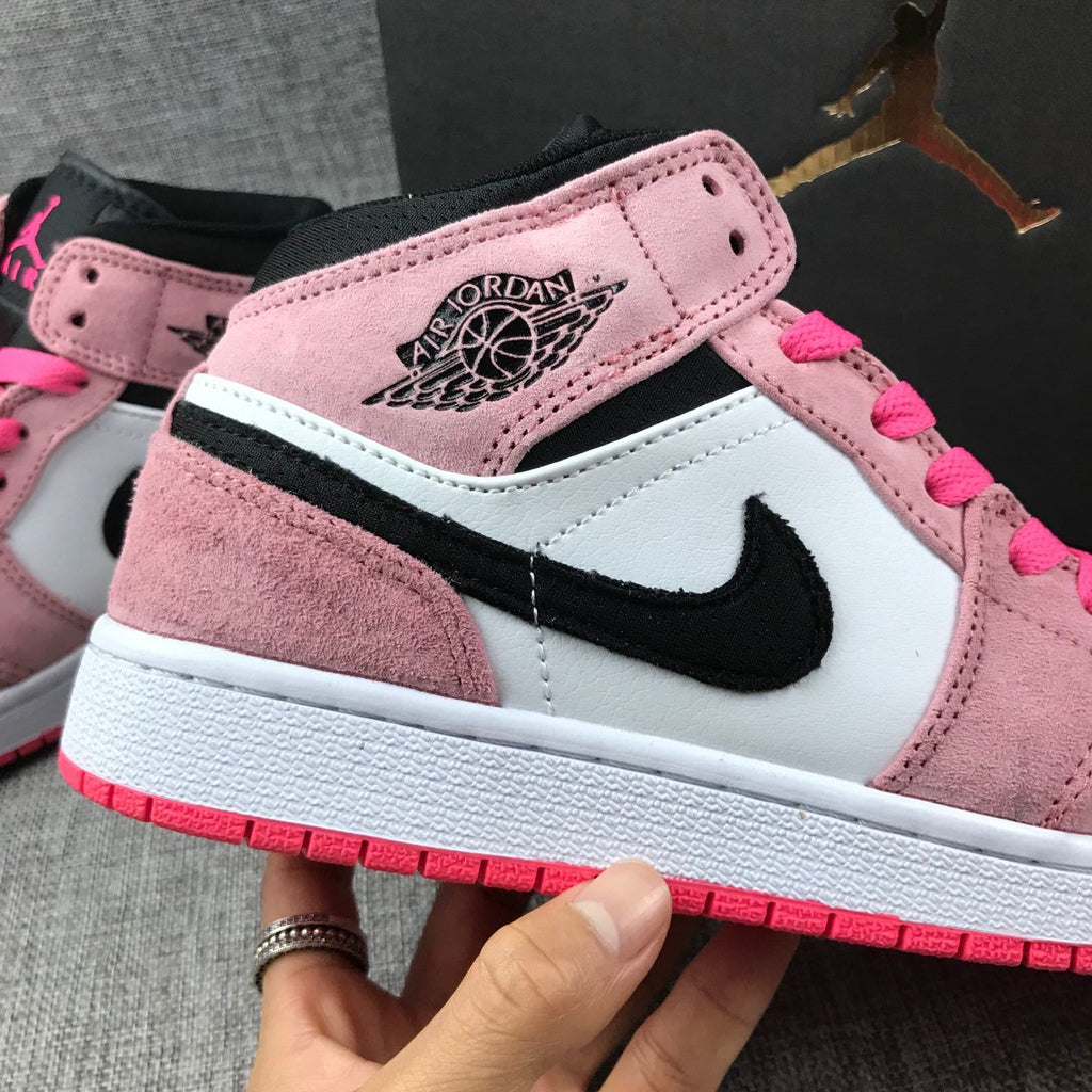 Air Jordan 1 Mid Sneakers in Pink 852542-801 - product image from the listing.