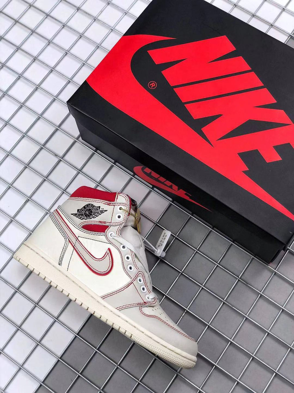 Air Jordan 1 Retro High OG Sneakers in White and Red - product image from the listing.