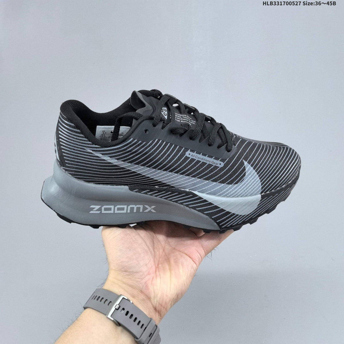 Black and Gray Nike ACG Ultrafly Trail Running Shoes - product image from the listing.