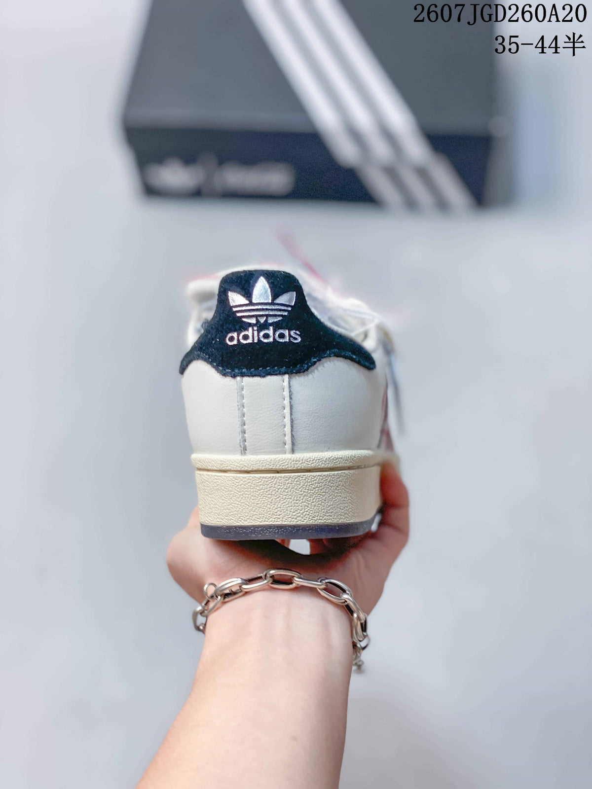 Adidas Superstar x Coca-Cola Low-Top Sneakers in White KH6892 - product image from the listing.