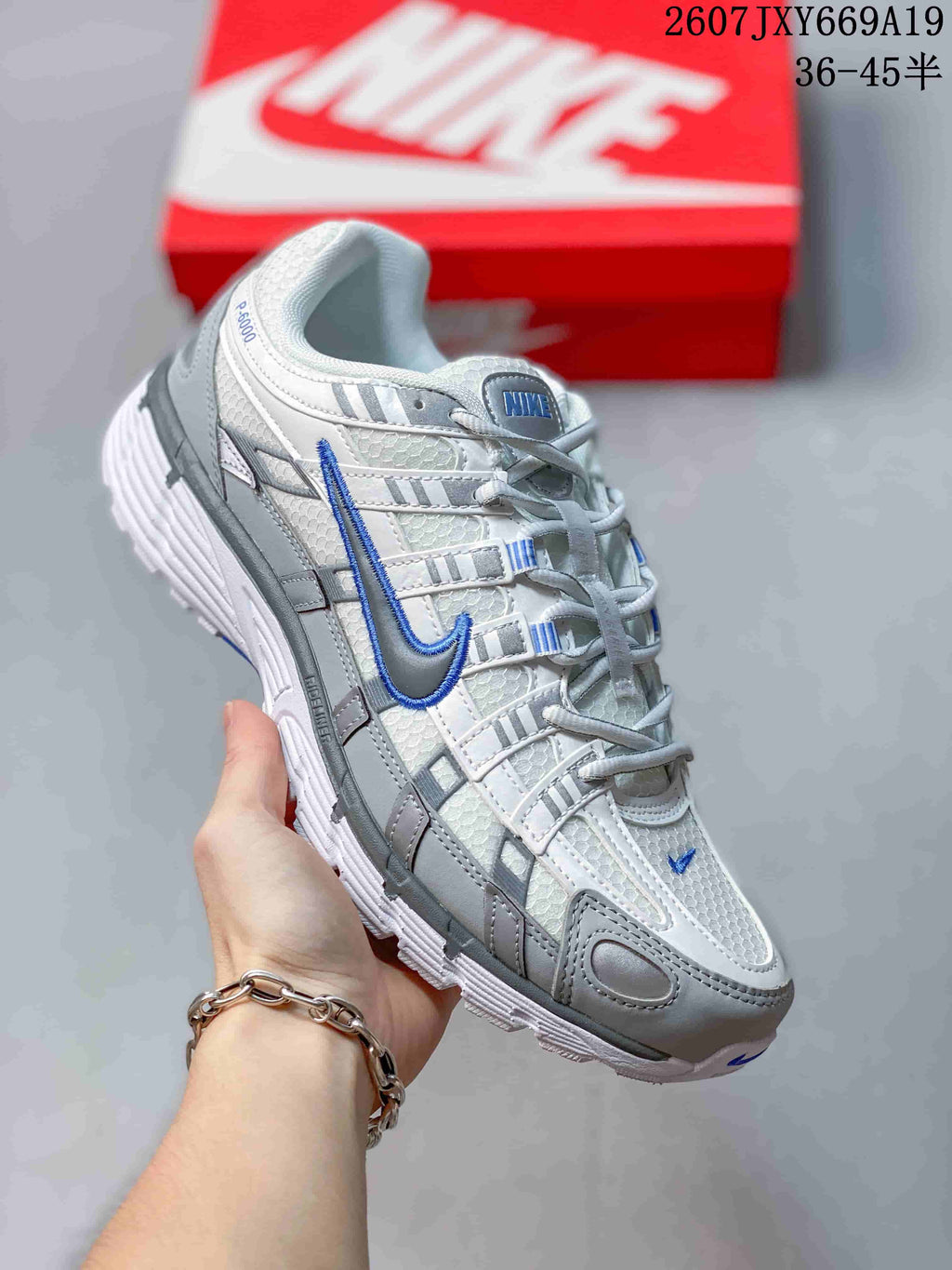 Nike P-6000 Retro Running Sneakers in White Grey Blue - product image from the listing.