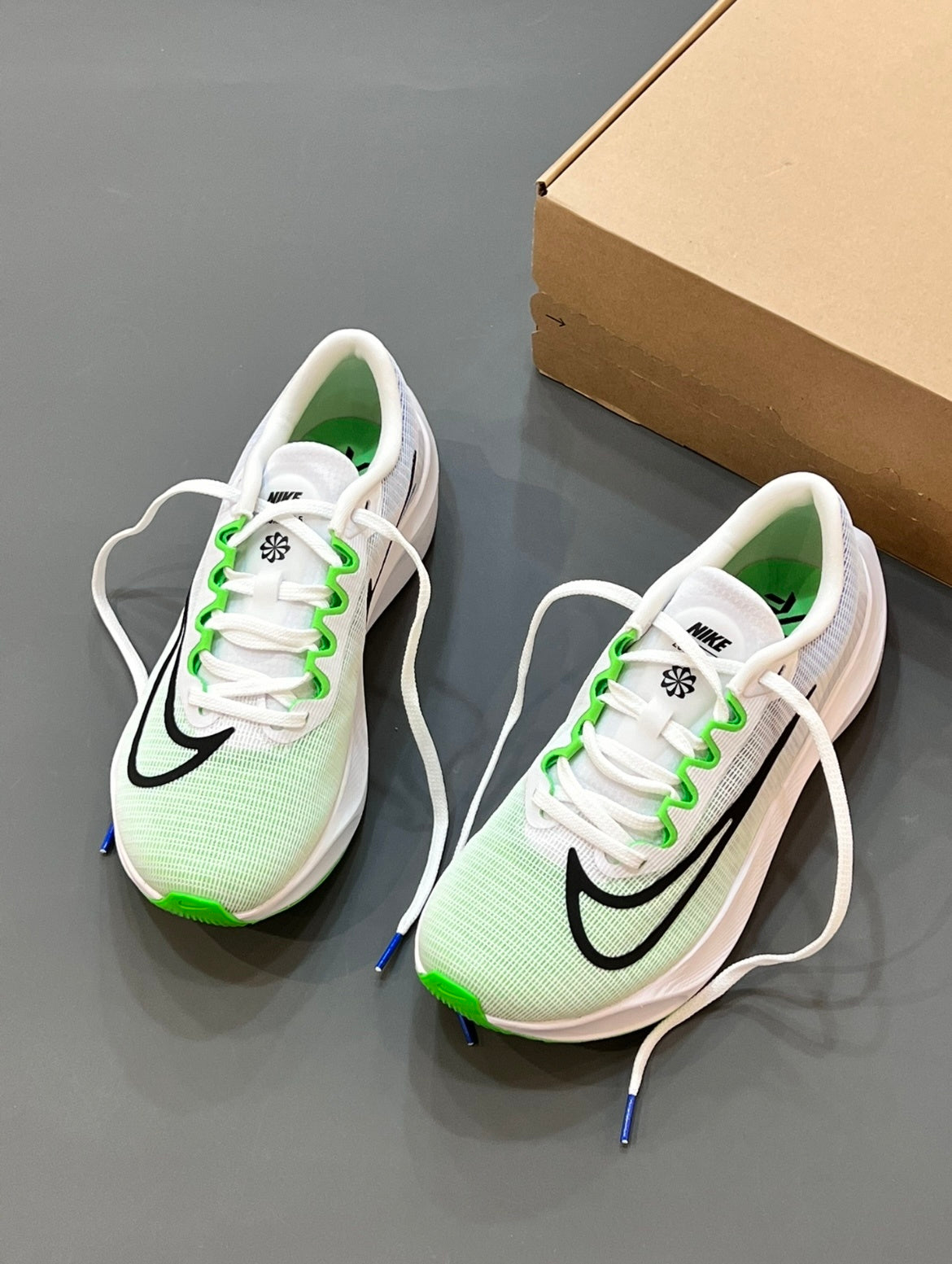 Nike Zoom Fly 5 Running Shoes in White Green Blue DM8968-101 - product image from the listing.