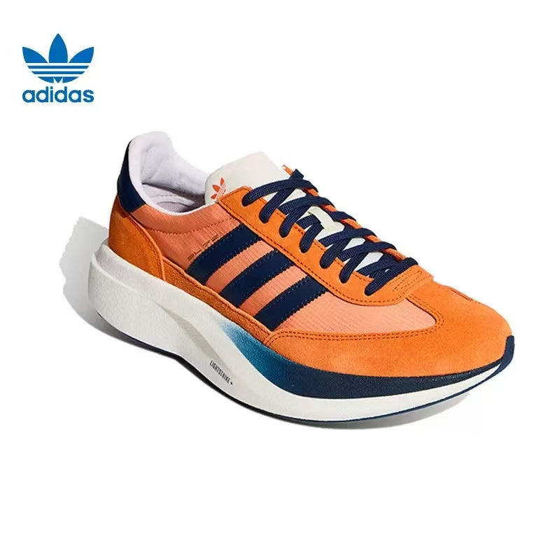 adidas Lightstrike Sneakers in Orange and Navy - product image from the listing.