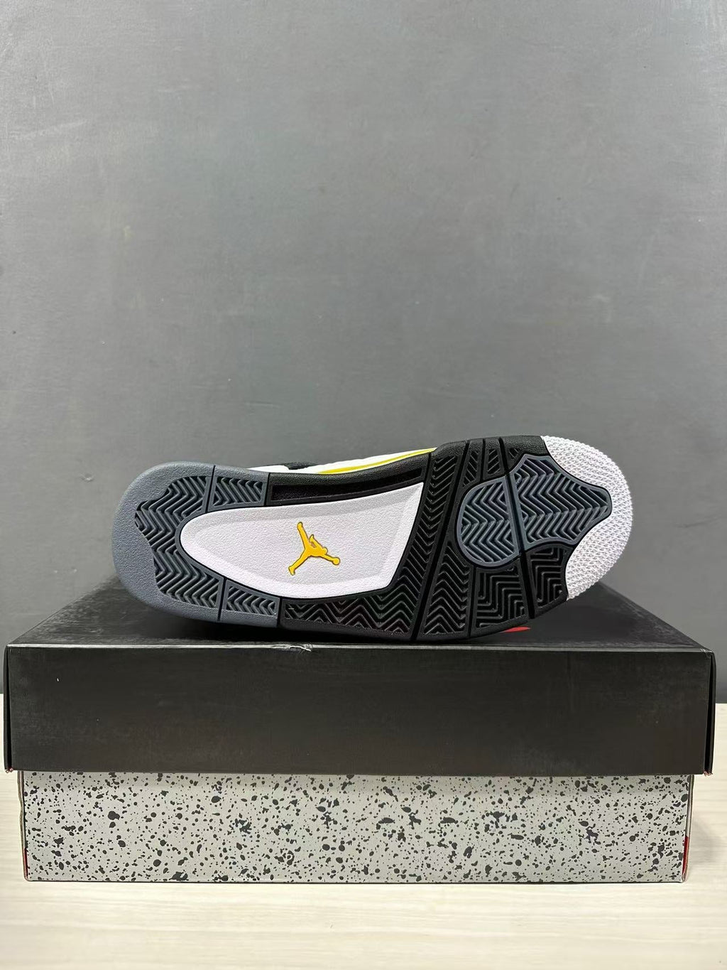 Air Jordan 4 Retro White Yellow Black Sneakers IO2468-102 - product image from the listing.