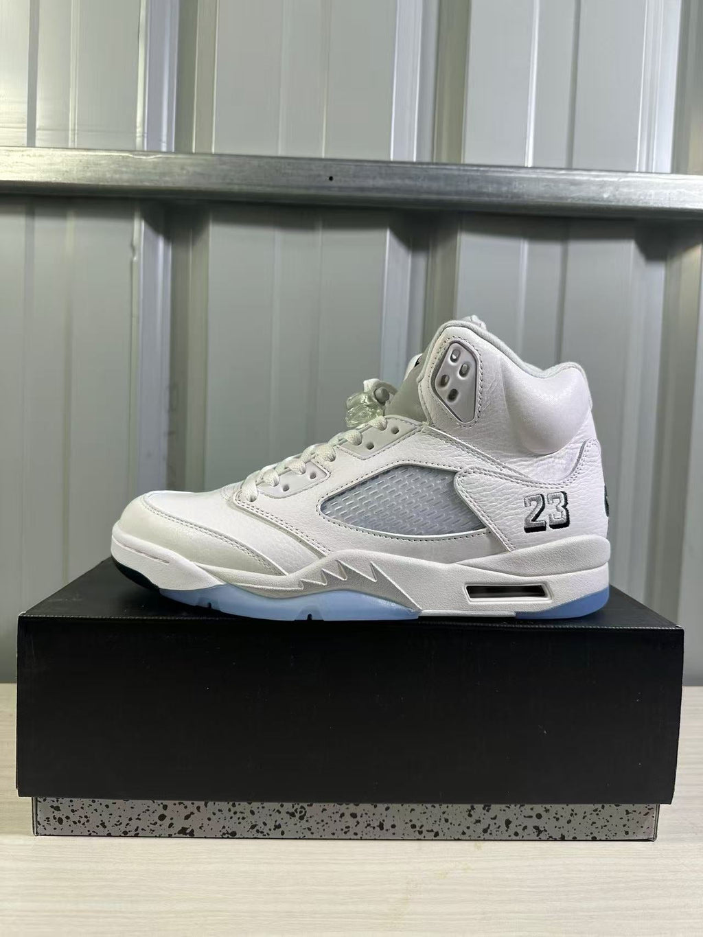 Air Jordan 5 Sneakers in White Silver HQ7978-103 - product image from the listing.