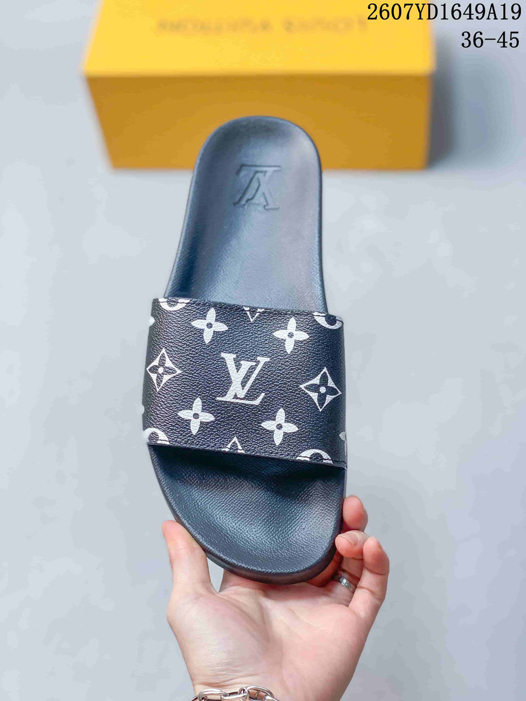 Louis Vuitton Monogram Platform Slide Sandals in Black 2607YD1649A19 - product image from the listing.