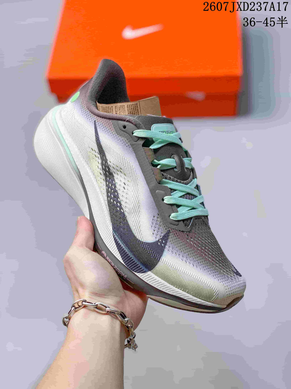 Nike Air Zoom Pegasus 42 Running Shoes in Gray Mint JXD237A17 - product image from the listing.