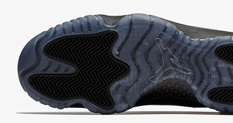 Air Jordan 11 Cap and Gown High-Top Sneakers in Black - product image from the listing.