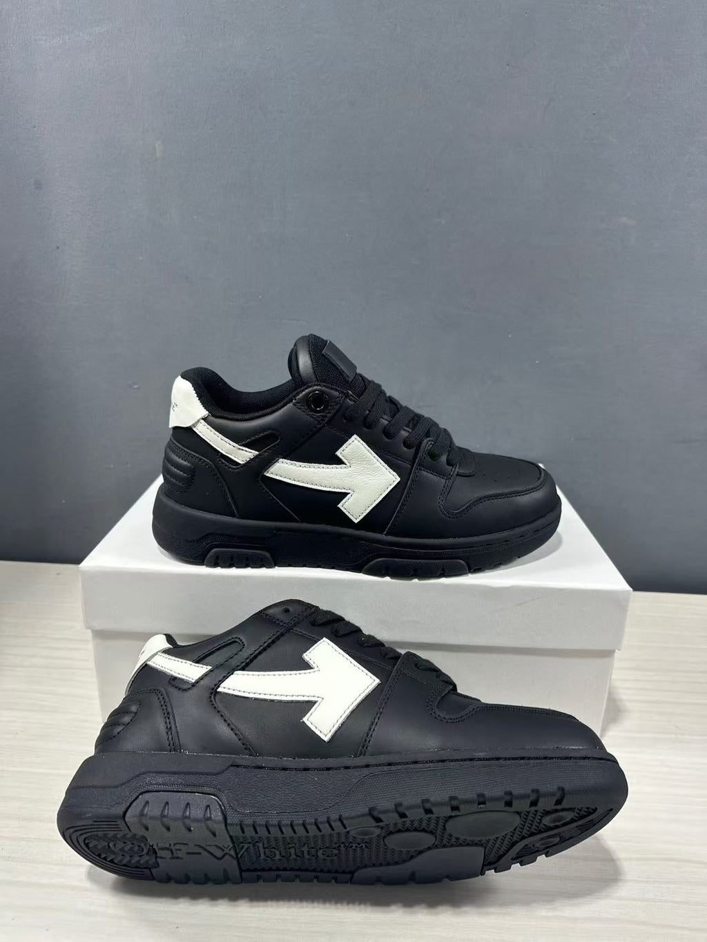 Off-White Out Of Office Low-Top Sneakers in Black White OMAI89C99LEA0191001 - product image from the listing.