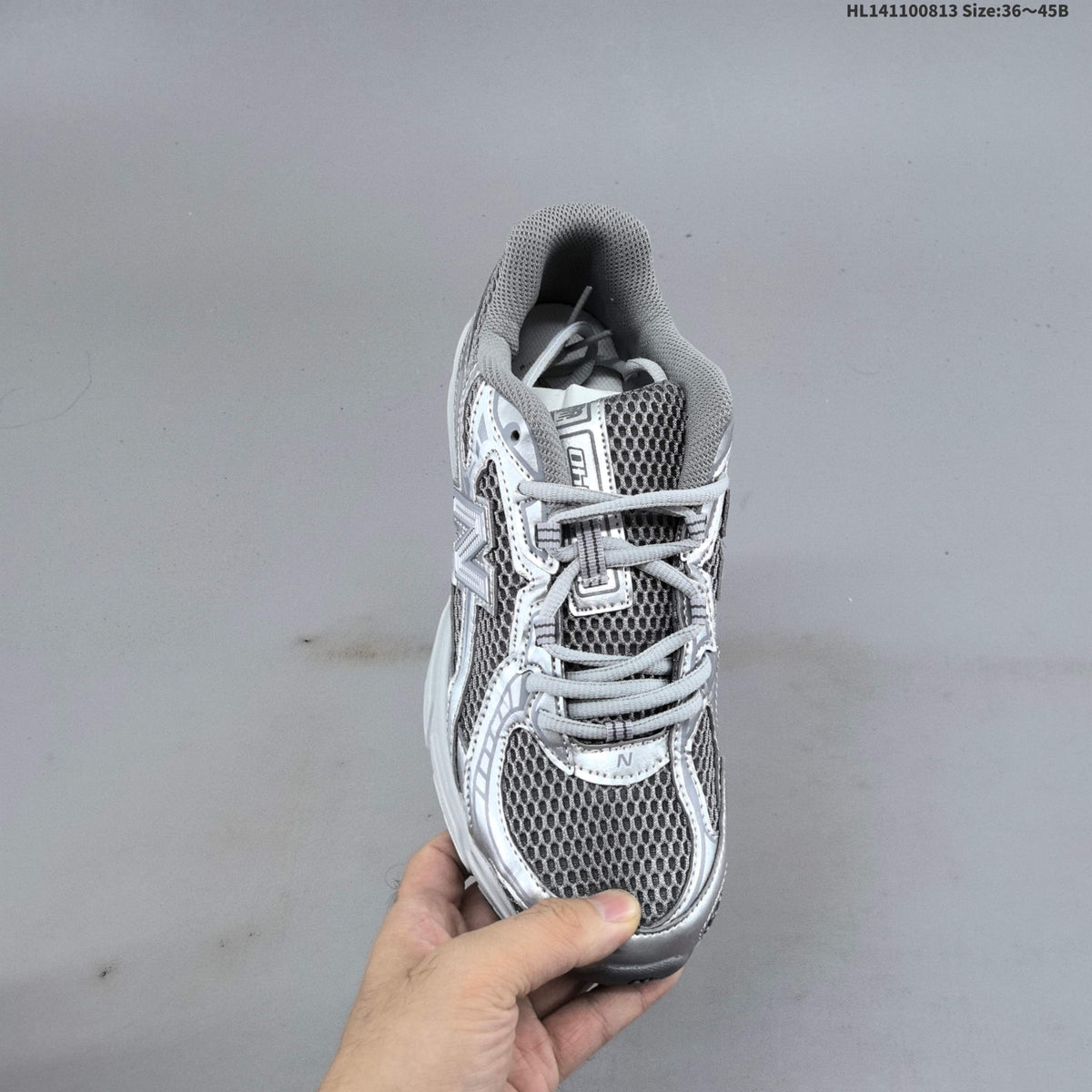 Grey and Silver New Balance 740 Sneakers CR740MG - product image from the listing.