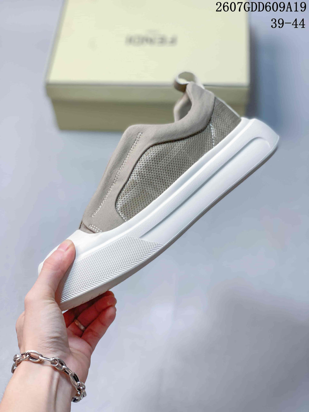 Fendi GDD609A19 Slip-On Sneakers in Taupe and White - product image from the listing.
