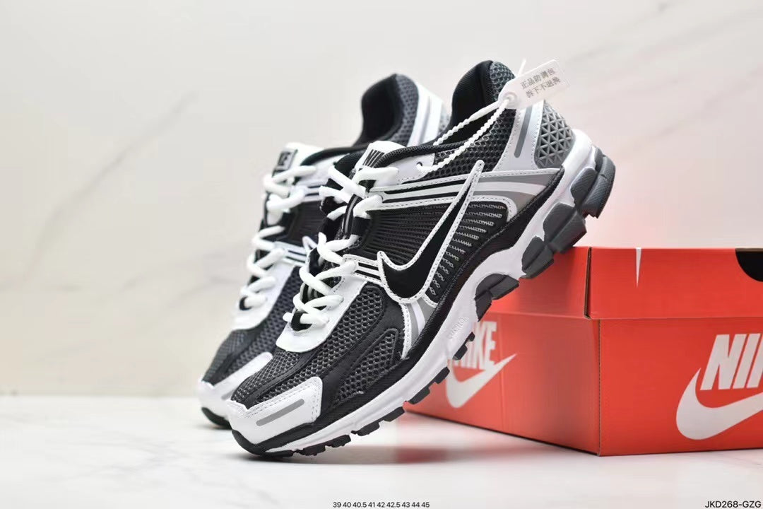 Nike Air More Uptempo Sneakers in Black and White - product image from the listing.