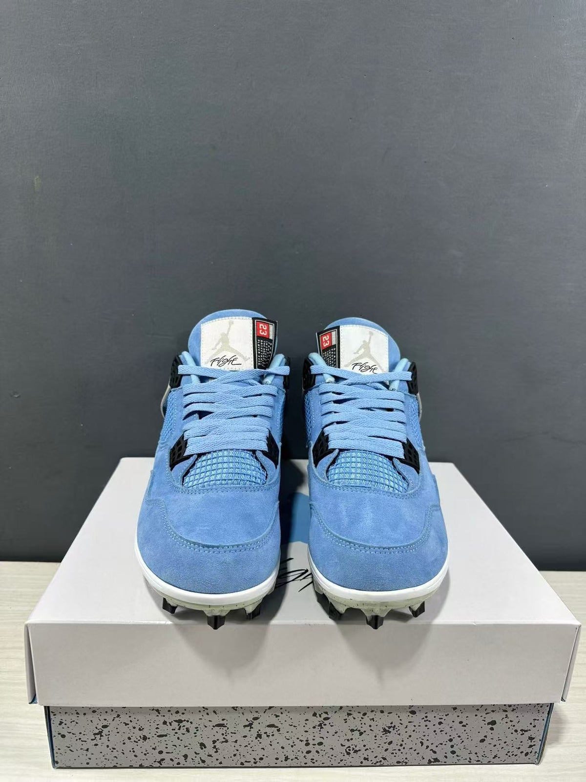 Air Jordan 4 University Blue Cleats CT8572-400 - product image from the listing.