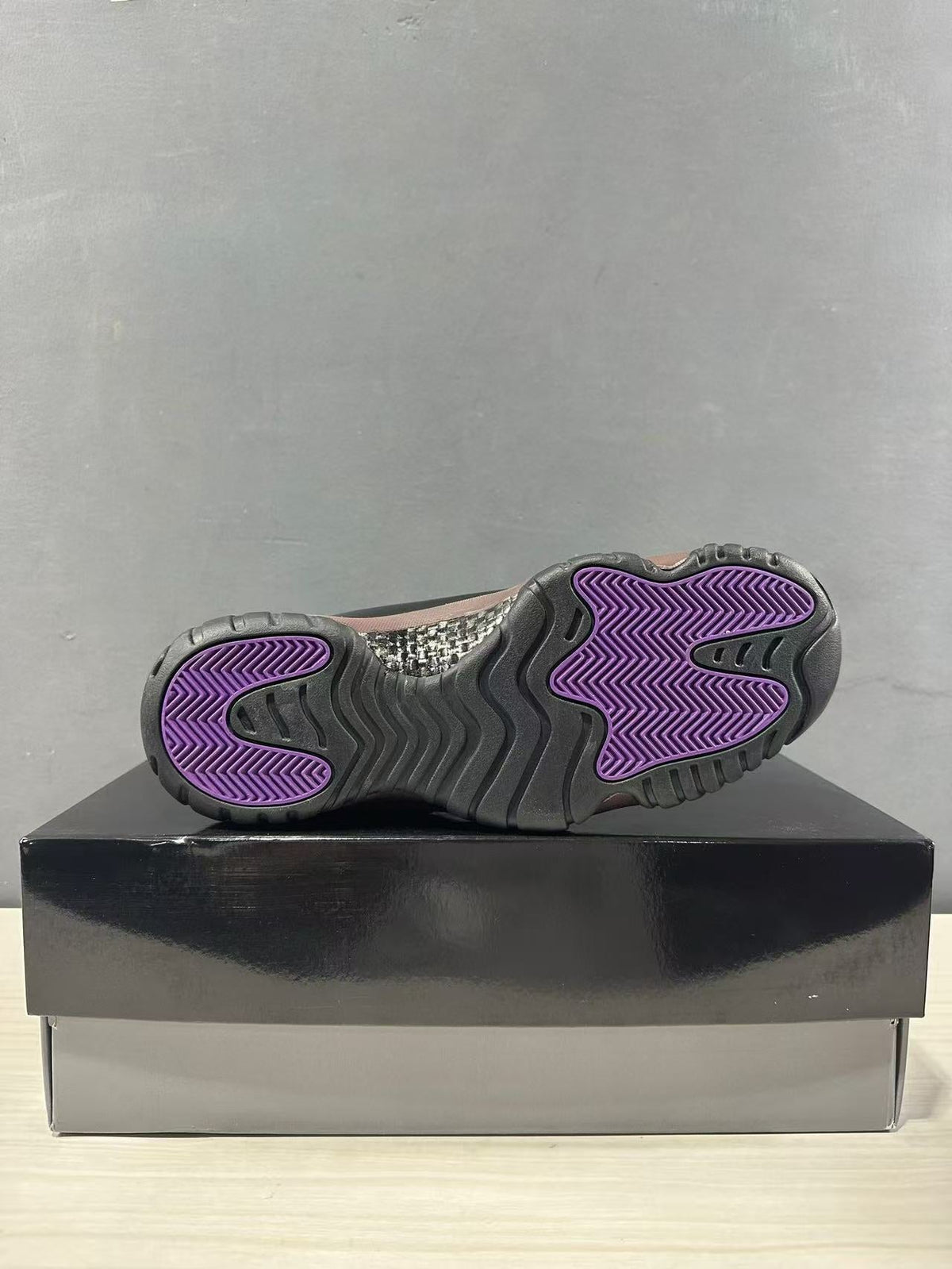Air Jordan 11 Retro Black Bronze High-Top Sneakers - product image from the listing.