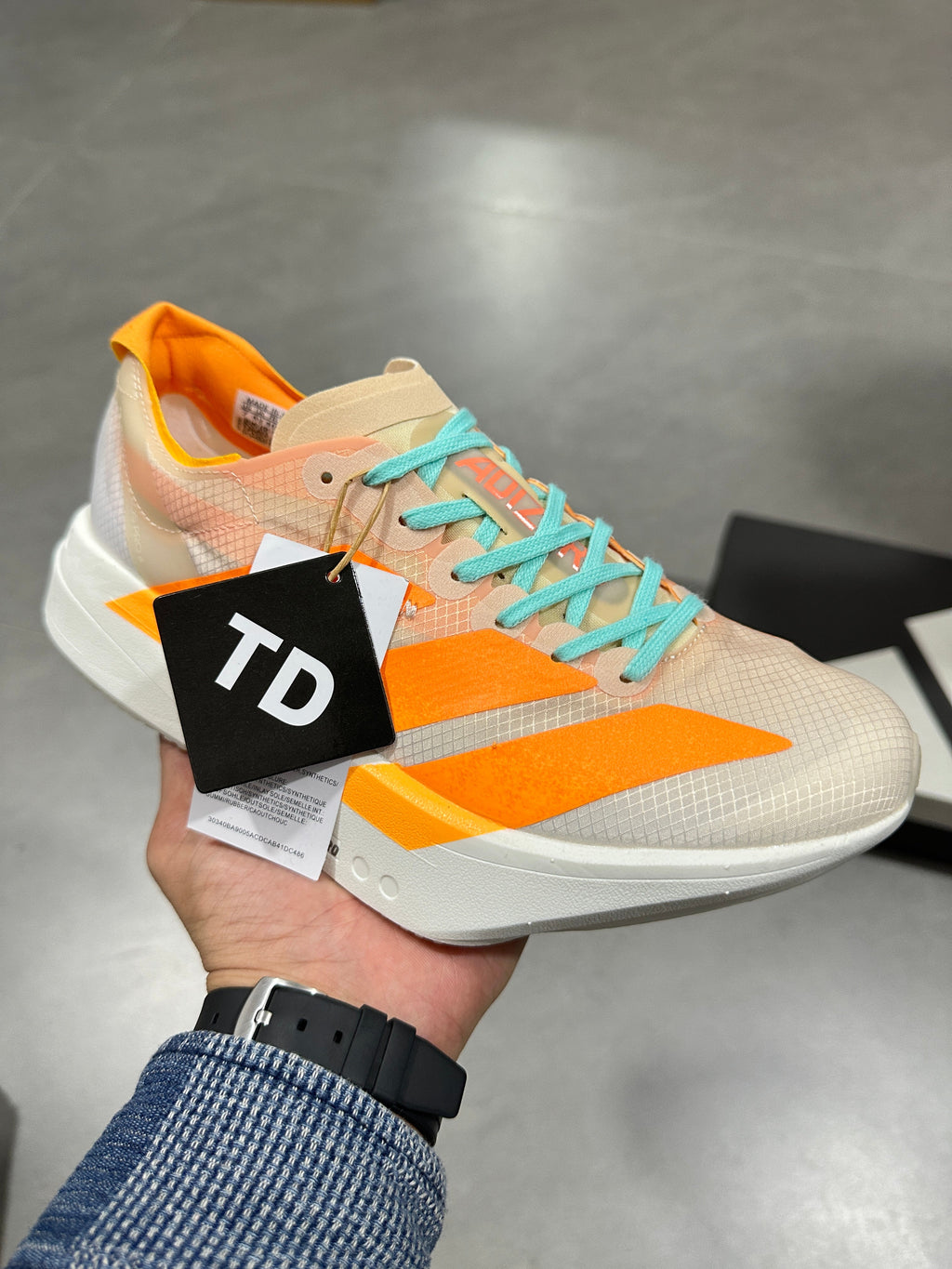 Nike Lightstrike Pro Running Shoes in White Orange Turquoise - product image from the listing.