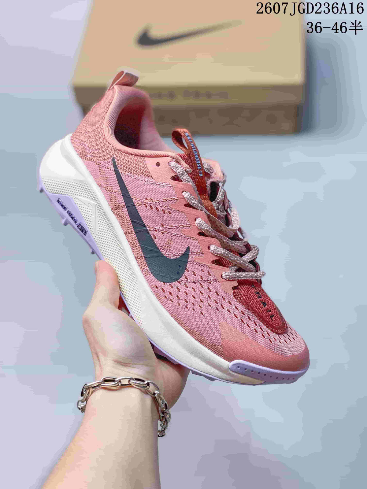 Nike ReactX Wildhorse 10 Trail Shoes in Pink - product image from the listing.