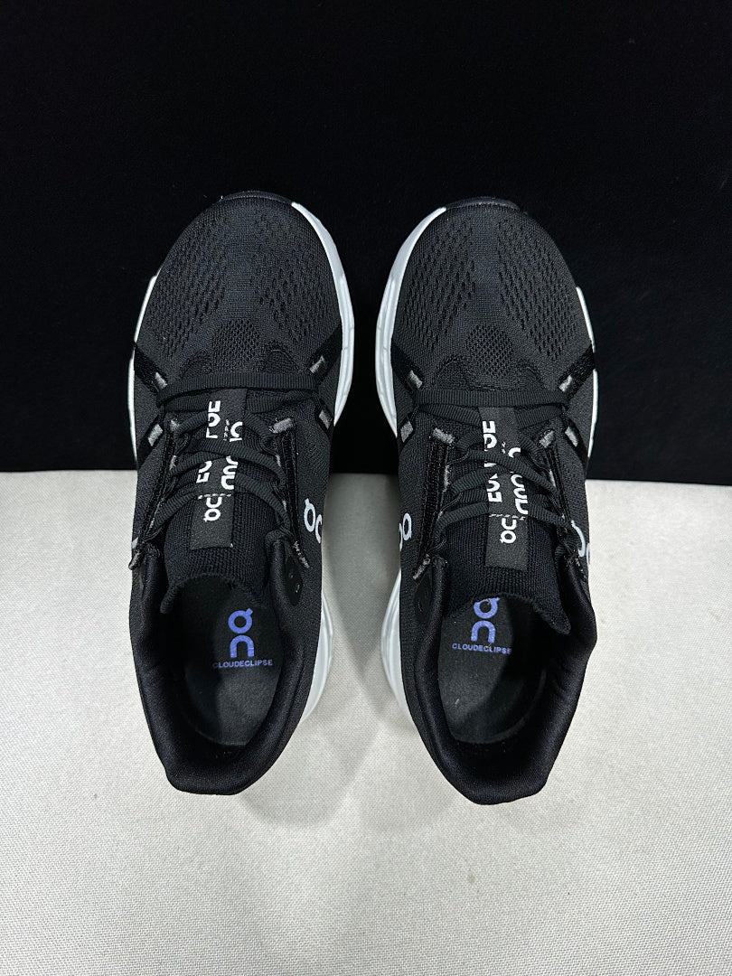On CloudEclipse Running Shoes in Black and White - product image from the listing.
