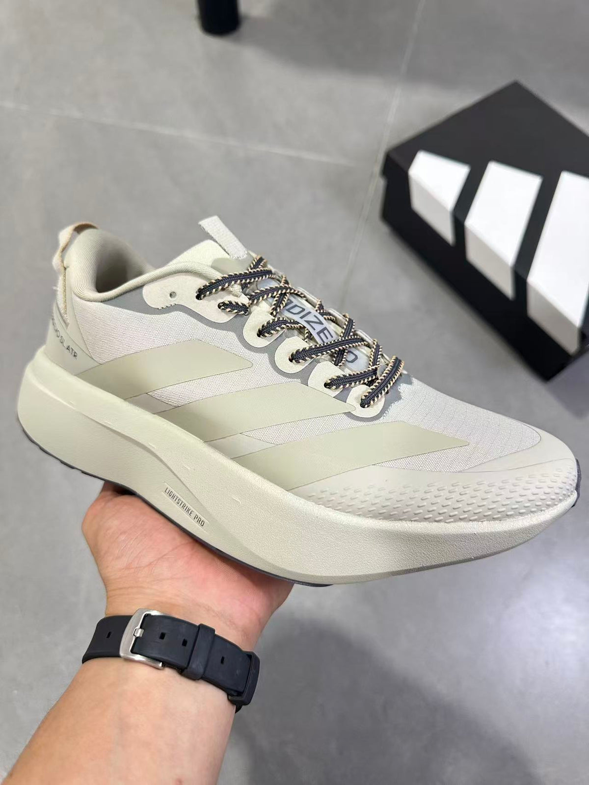 Adizero EVO SL ATR Running Shoes, in Light Brown - product image from the listing.