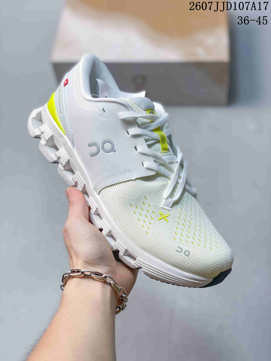 On Running Cloud X 4 AD Sneakers in White Lime 2607JJD107A17 - product image from the listing.
