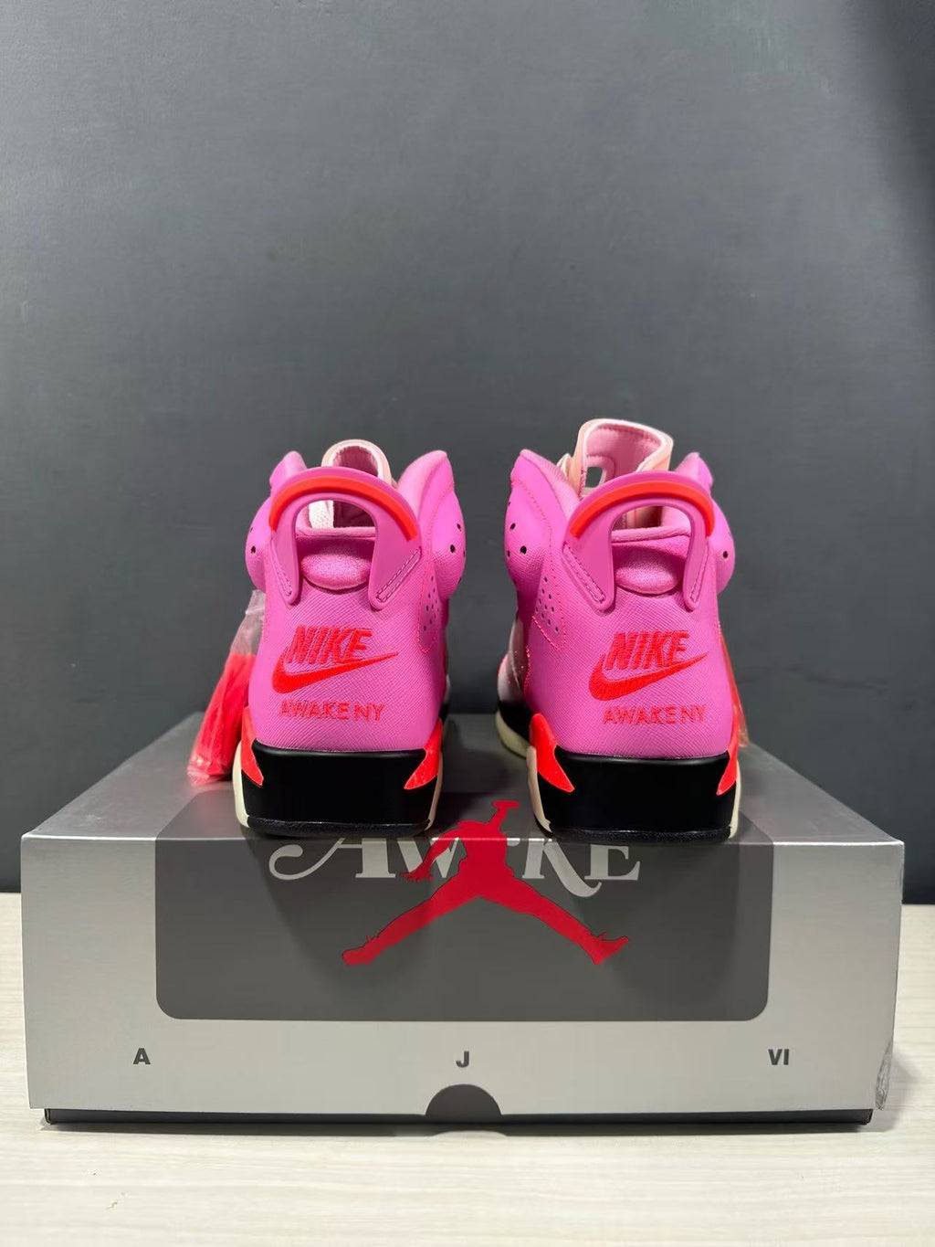 Jordan x Awake NY Air Jordan 6 Retro SP Sneakers in Pink IQ5706-600 - product image from the listing.