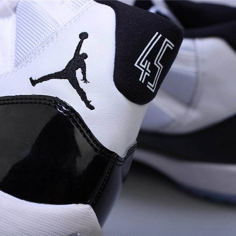 Air Jordan 11 Concord Black White Sneakers - product image from the listing.
