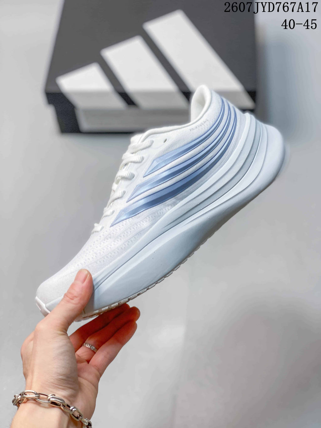 adidas Supernova Rise 4 M Sneakers in White Blue 711570YWI - product image from the listing.