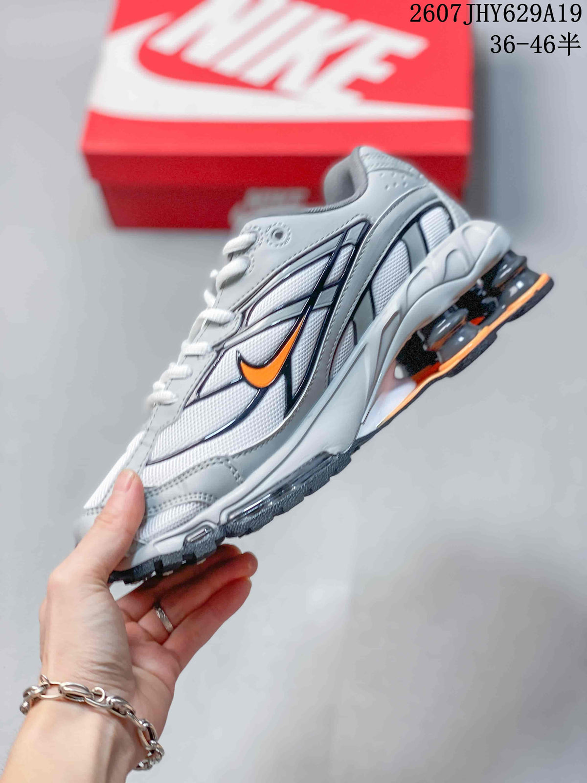 Nike Shox Ride 2 Sneakers in Grey White Orange 711395WPR - product image from the listing.