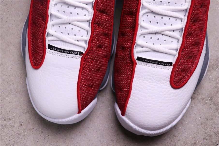 Air Jordan 13 Red Flint Sneakers 414571-600 - product image from the listing.
